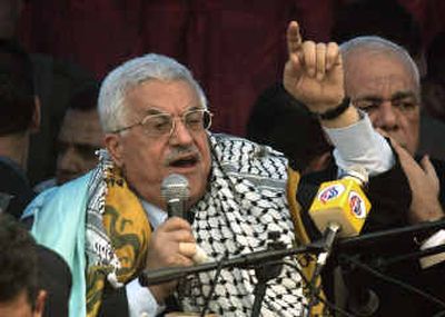 
Interim Palestinian leader and presidential front-runner Mahmoud Abbas speaks to supporters Tuesday during a campaign rally.Interim Palestinian leader and presidential front-runner Mahmoud Abbas speaks to supporters Tuesday during a campaign rally.
 (Associated PressAssociated Press / The Spokesman-Review)