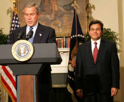 
President Bush announces his choice of White House counsel Alberto Gonzales to succeed Attorney General John Ashcroft, in the Roosevelt Room of the White House on Wednesday. 
 (Associated Press / The Spokesman-Review)