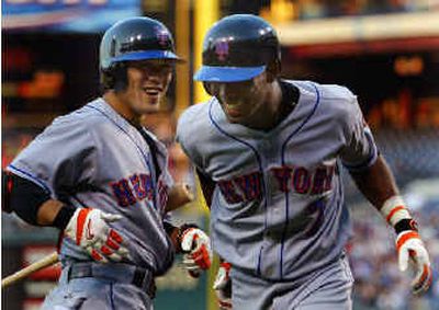 
Jose Reyes, right, smiles with Mets teammate Kaz Matsui after his second homer. 
 (Associated Press / The Spokesman-Review)