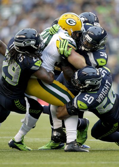 Despite Monday’s controversial finish, there was nothing cheap about Seahawks’ defense. (Associated Press)