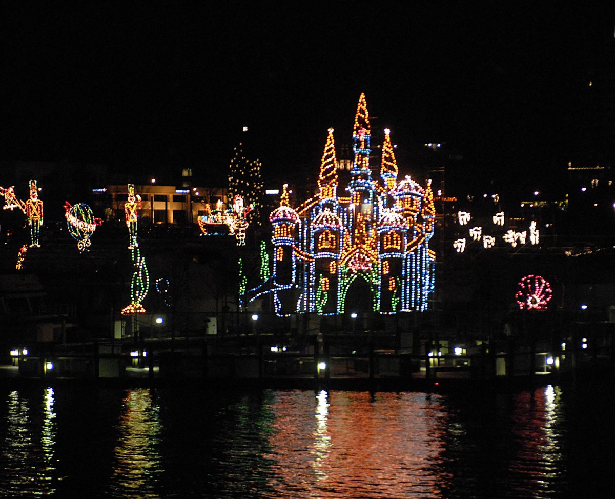 The boardwalk at The Coeur d’Alene Resort magically comes to life every night during the holiday at the on-the-water light show. (J. BART RAYNIAK Photos / The Spokesman-Review)