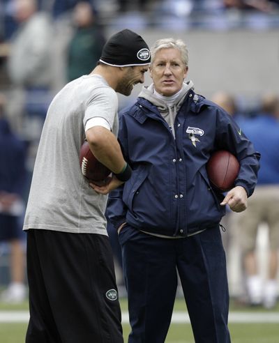 Philadelphia Eagles quarterback Mark Sanchez, left, and Pete Carroll have history that predates NFL. (Associated Press)