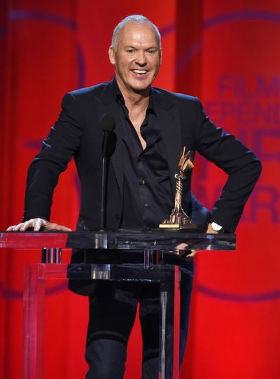 Michael Keaton accepts the award for best male lead for “Birdman.”
