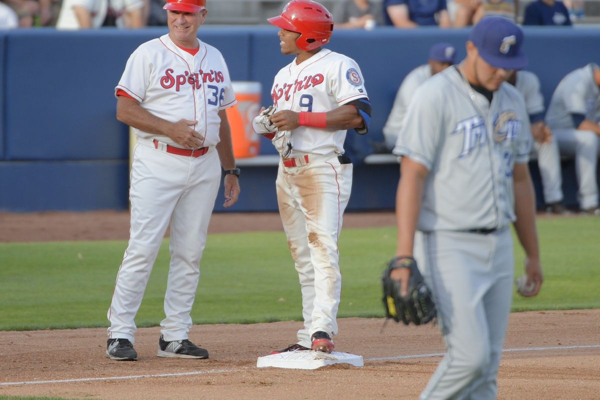 Outfielder LeDarious Clark, right, talks with Indians manager Tim Hulett. Clark is one of three Indians on the NWL All-Star roster and Hulett will manage the team. (Jesse Tinsley)