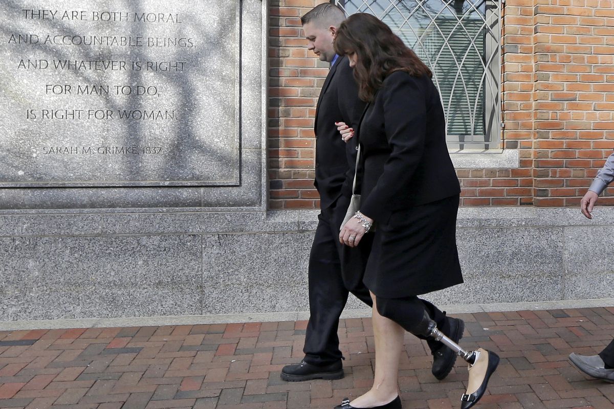 Boston Marathon bombing survivor Karen Rand walks from federal court in Boston after closing arguments in the federal death penalty trial of suspect Dzhokhar Tsarnaev on Monday. (Associated Press)