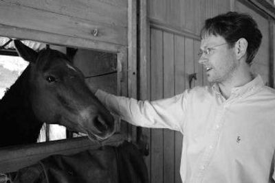 
Michael Schuppenhauer pets his wife's horse, Count Luvatraz, at his home in Half Moon Bay, Calif. 
 (Associated Press / The Spokesman-Review)