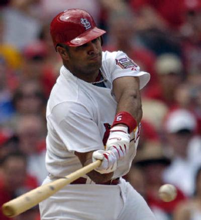 
Hall of Famer Frank Robinson says St. Louis' Albert Pujols has the ability to win the Triple Crown. 
 (Associated Press / The Spokesman-Review)