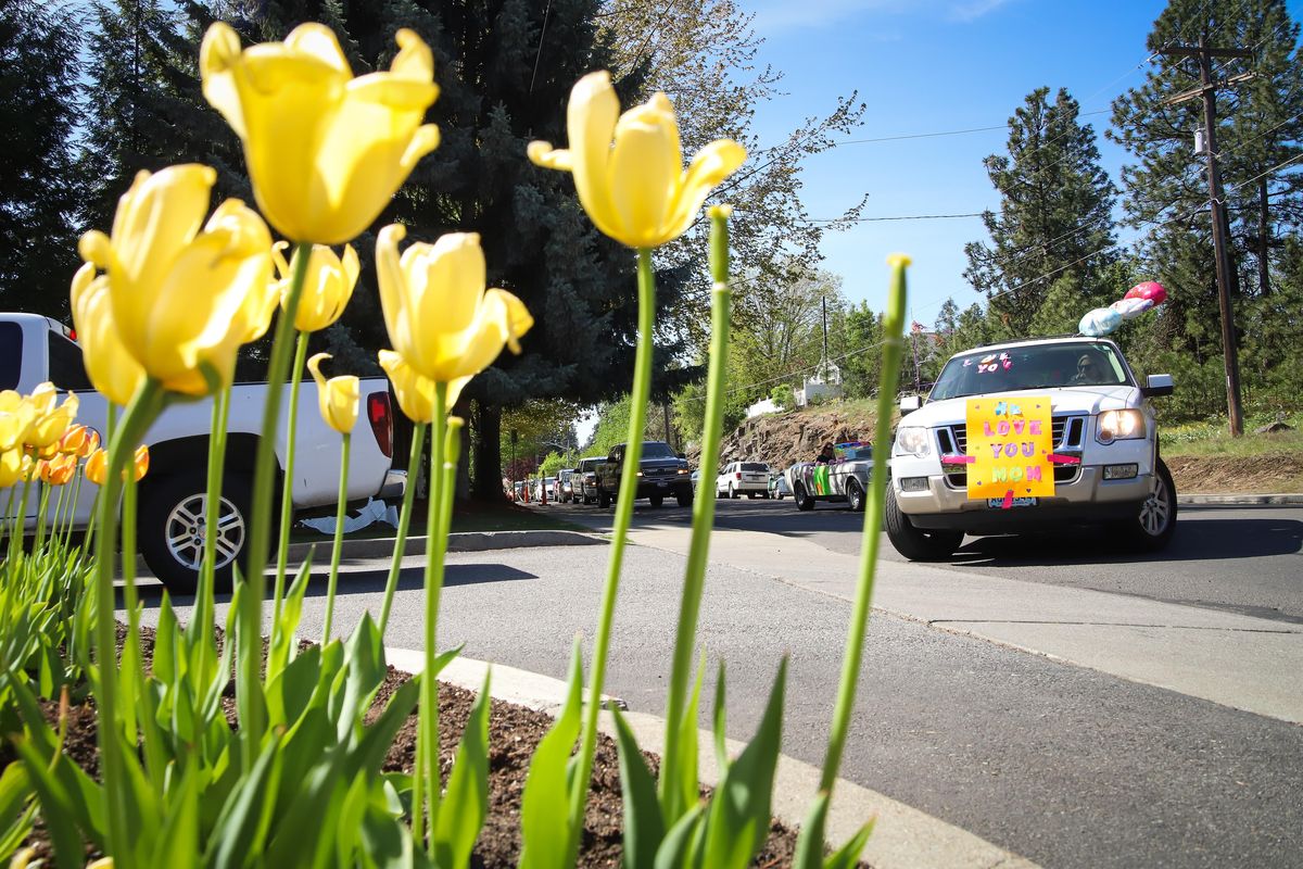 Visitors to Touchmark On the South Hill participate in a socially distanced Mother