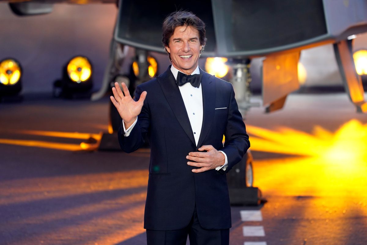 Tom Cruise poses for the media during the 