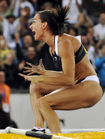 Russian Yelena Isinbayeva reacts after setting a world record.  (Associated Press / The Spokesman-Review)