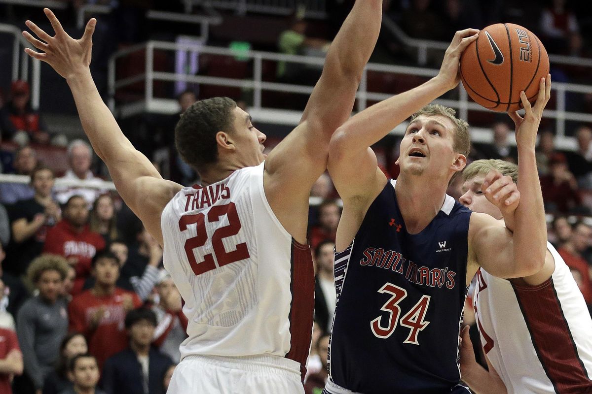 Saint Mary’s Jock Landale, right, shoots against Stanford’s Reid Travis (22) during the first half of an NCAA college basketball game Wednesday, Nov. 30, 2016, in Stanford, Calif. (Ben Margot / Associated Press)
