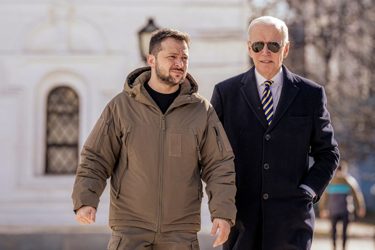 President Joe Biden, right, is escorted by President Volodymyr Zelenskyy of Ukraine as he visits Kyiv, Ukraine