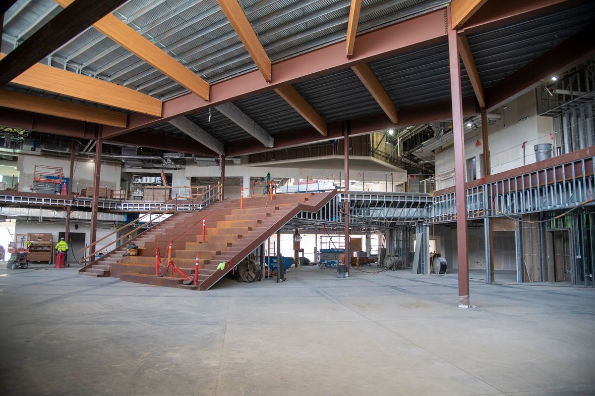 The two-story commons area of the new Flett Middle School, shown Wednesday, has a wide staircase that includes seating that can be used for instruction or watching movies in the area. The school, in the old parking lot of Joe Albi Stadium, is planned for a fall opening.  (Jesse Tinsley/THE SPOKESMAN-REVIEW)