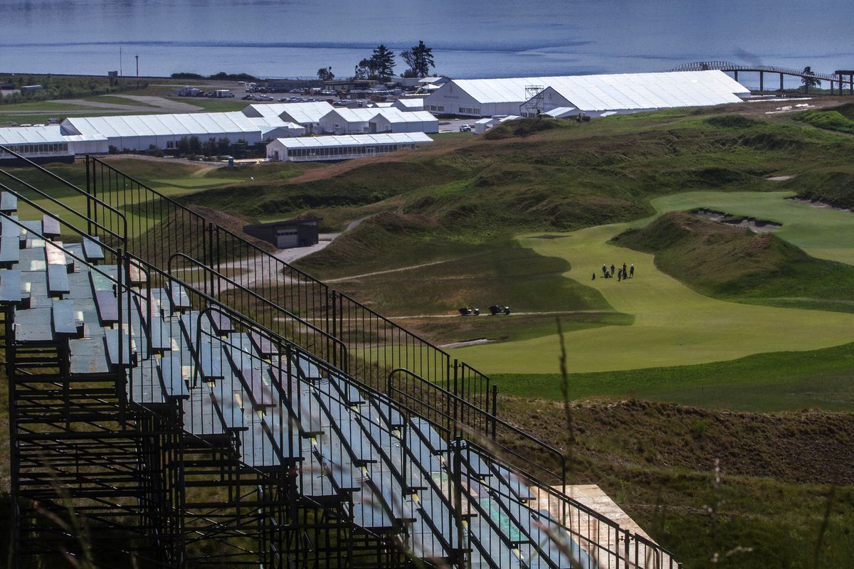 This May 14 photo shows bleachers that have been installed for golf fans attending the Northwest’s first U.S. Open, at Chambers Bay in University Place, Wash. The 5,000-plus volunteers who will work at the event next month will be coming from 45 states and 10 countries. About 80 percent are Washington residents. (Ellen M. Banner)