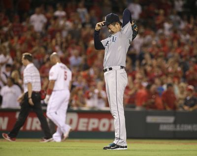 Hisashi Iwakuma’s frustration is shared by M’s fans and even certain prognosticators. (Associated Press)