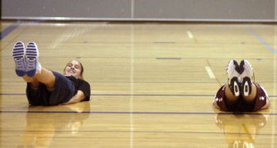 
Central Valley junior Justine Bowman keeps a good attitude during conditioning drills at practice. Below: The returning point guard and key playmaker leads a young Lady Bears team.
 (J. BART RAYNIAK photos / The Spokesman-Review)