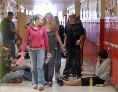 
Freeman High School students head to the cafeteria  while other students eat lunch in the halls of the overcrowded school.  
 (J. BART RAYNIAK / The Spokesman-Review)