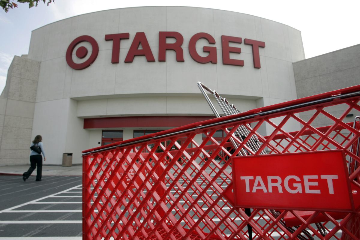 In this Nov. 20, 2007, file photo, the front entrance of a Target store in Newark, Calif., is shown. Target Corp. is under pressure after losing market share and customers to Wal-Mart, which credits its profits and sales growth to necessities like groceries and its powerful low-cost message.  (Associated Press / The Spokesman-Review)