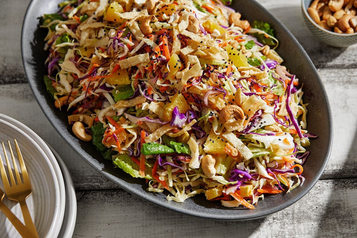 Orange and Cashew Cabbage Salad with Sesame Dressing is a great way to add some crunchy greens to your nutrition plan.  (Tom McCorkle/The Washington Post)