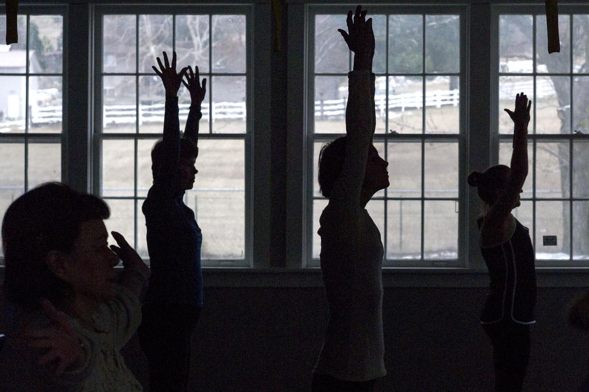 As more people turn to yoga - including this one for cancer patients at Cancer Care Northwest from 2015 - there are more oppportunities for yoga teachers in the region. (Tyler Tjomsland / The Spokesman-Review)