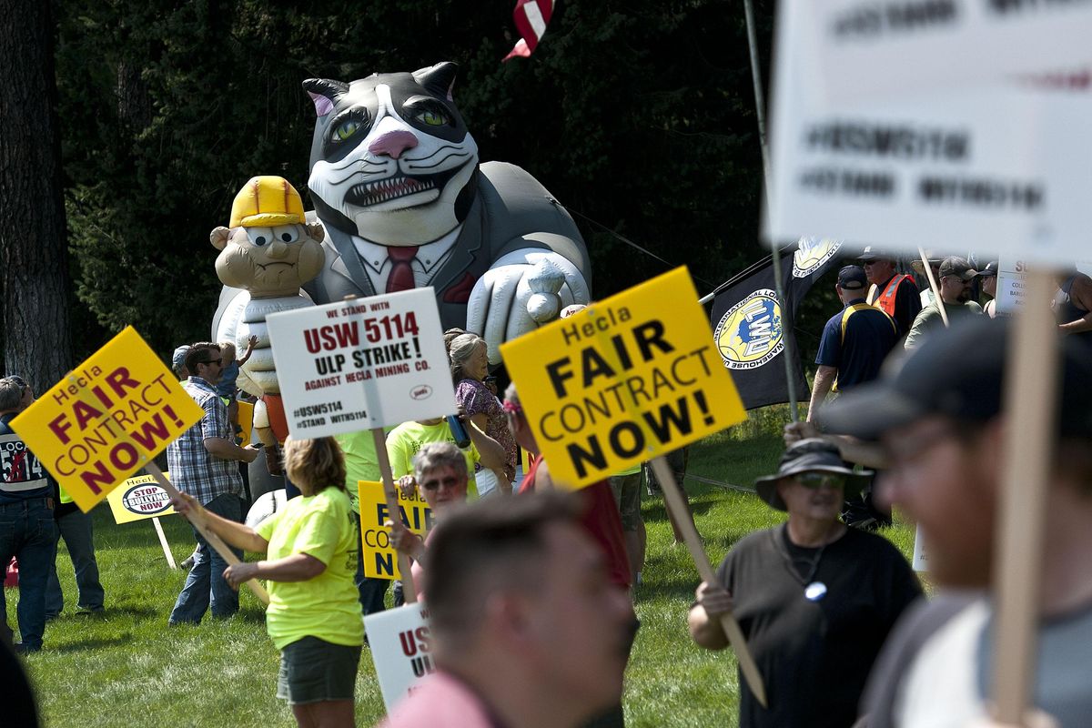 An inflatable “Fat Cat” looms above the crowd as United Steel Workers members and supporters rally at Hecla Mining Co.’s headquarters in Coeur d’Alene on Wednesday, Aug. 2, 2017. The miners of the Hecla’s Lucky Friday mine in Mullan have been on strike since March 12. (Kathy Plonka / KATHY PLONKA/The Spokesman-Review)