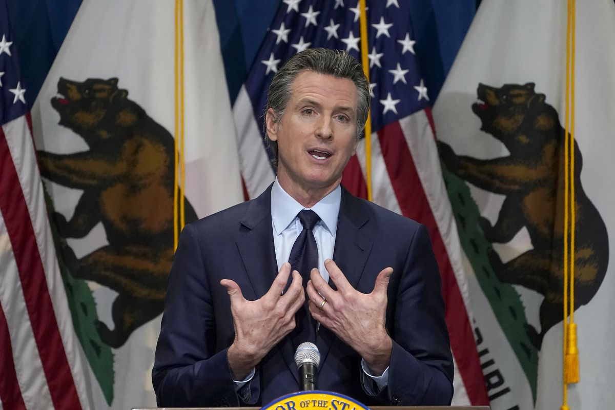 In this Jan. 8, 2021 photo, California Gov. Gavin Newsom outlines his 2021-2022 state budget proposal during a news conference in Sacramento, Calif. The California Democratic Party is gathering for its annual convention on the heels of a recall against Newsom reaching the signature threshold to qualify for the ballot.  (Rich Pedroncelli)