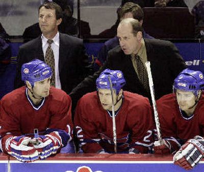 
Interim coach Bob Gainey, right, and associate coach Guy Carbonneau saw the Canadiens beat the Sharks in their first game behind the bench.  
 (Associated Press / The Spokesman-Review)