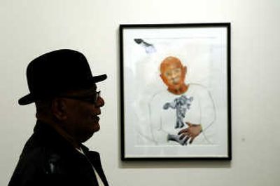 
Ruben Trejo poses with his self-portrait at 