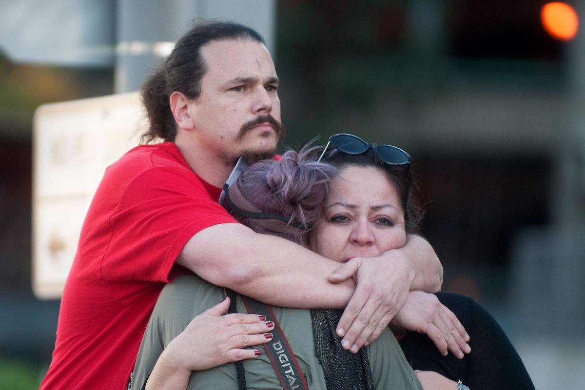 Shocked supporters of Kelly Thomas react Monday outside the Santa Ana Courthouse, after the “not guilty” verdicts in his beating death. (Associated Press)