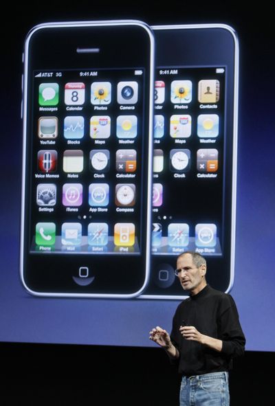 Apple Chairman and CEO Steve Jobs speaks against an iPhone backdrop at an April event at Apple Inc. in Cupertino, Calif.  (File Associated Press)