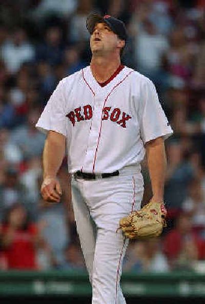 
Whether good or bad, Boston Red Sox starter Derek Lowe has always been one to show his emotions on the mound.
 (Associated Press / The Spokesman-Review)