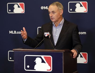 This Feb. 8, 2019,  photo shows Rob Manfred, commissioner of Major League Baseball, speaking during a news conference at owners meetings in Orlando, Fla. Major League Baseball and the players’ union are near an agreement to expand active rosters by one to 26 starting in 2020 as part of a deal that would include a commitment to discuss larger economic issues after opening day. (John Raoux / Associated Press)