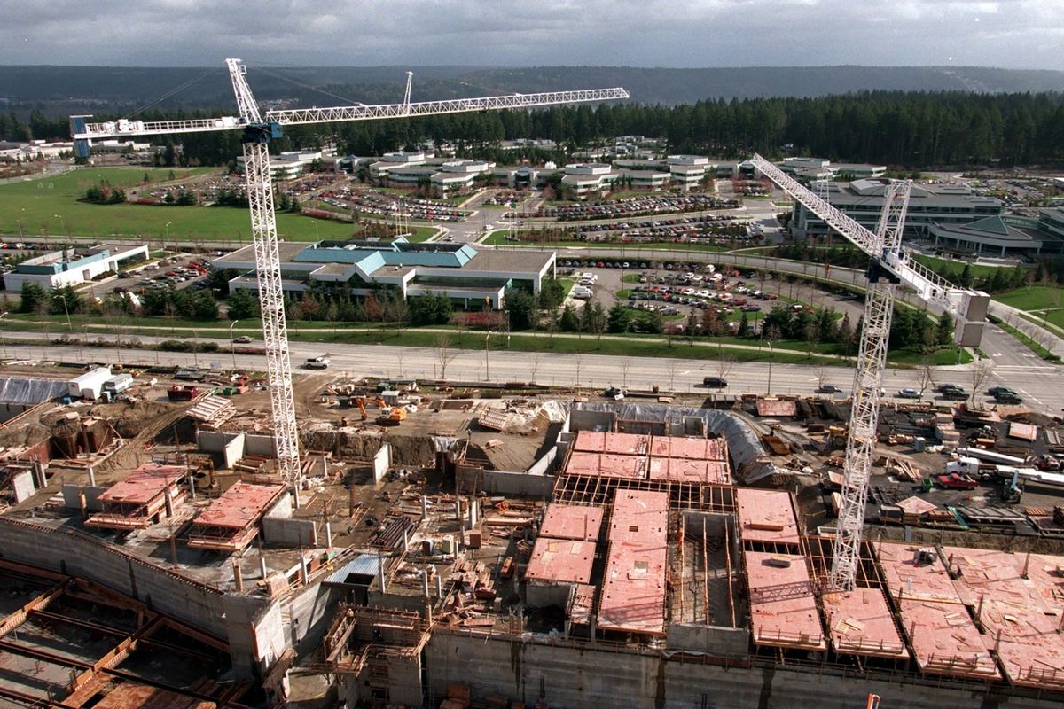In 1997, two construction cranes rise on the west side of the Microsoft Campus as work continues. Existing Microsoft buildings are in the background. (Greg Gilbert/The Seattle Times/TNS)