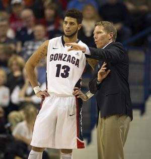 Gonzaga coach Mark Few surveys the situation with Josh Perkins. (Colin Mulvany)