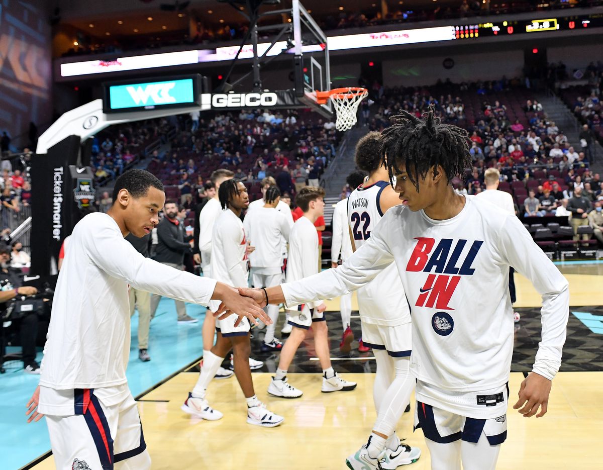 Gonzaga Bulldogs guard Hunter Sallis (10) and guard Nolan Hickman (11), at right, get pumped before the first half of the WCC Men’s Semifinal basketball game against the San Francisco Dons on Monday Mar 7, 2022, in Las Vegas, Nev.  (Tyler Tjomsland/The Spokesman-Review)