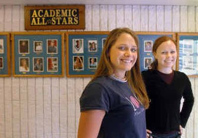 Kara Eberle, left, and Marki Grimsley are the valedictorian and salutatorian, respectively, at Coeur d'Alene High for this year. In the past, there have been as many as 12 valedictorians because there were so many students whose perfect grades were considered equal. Now the school has instituted a weighted grading system to yield only one valedictorian.
(Jesse Tinsley / The Spokesman-Review)