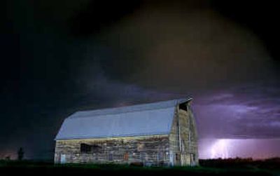 
The barn near Fred Meyer in Coeur d'Alene, once an island in farmland, now is an island in development.
 (File/Tom Davenport / The Spokesman-Review)