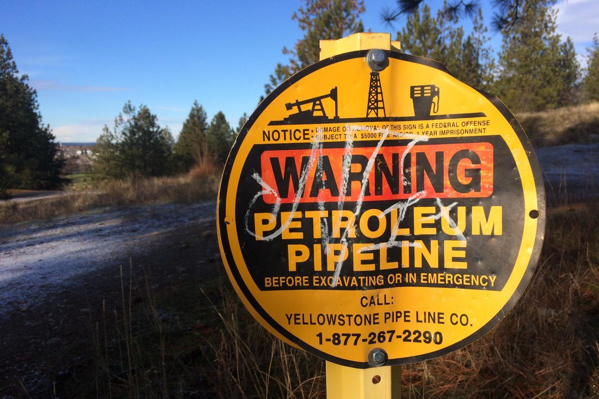 A sign for the Yellowstone Pipe Line at Minnehaha Park is shown on Dec. 30, 2018. Spokane city leaders are considering a new 25-year agreement with the Yellowstone Pipe Line Co. to continue operations in Spokane.  (Jonathan Brunt/The Spokesman-Review)