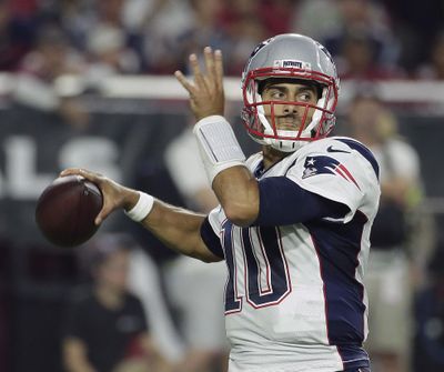 In this Sept. 11, 2016, file photo, New England Patriots quarterback Jimmy Garoppolo (10) looks down field during an NFL football game against the Arizona Cardinals in Glendale, Ariz. With backups quarterbacks like Garoppolo, Mike Glennon, A.J. McCarron and Colt McCoy possibly on the move this offseason, the task for talent evaluators will be figuring out which group best fits each quarterback. (Rick Scuteri / Associated Press)