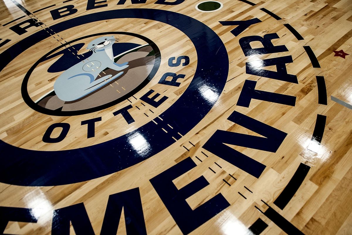 The gymnasium floor displays the otter mascot at Riverbend Elementary School in Greenacres on Monday, Aug. 20, 2018. The new school in the Central Valley School District is one of several school projects funded by a construction bond approved by voters in 2015. (Kathy Plonka / The Spokesman-Review)