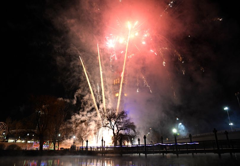 Fireworks explode above the riverfront Park clock Tower Thursday, January 1, 2015. Thousands flocked to the downtown festivities at First Night Spokane. JESSE TINSLEY jesset@spokesman.com (Jesse Tinsley / The Spokesman-Review)