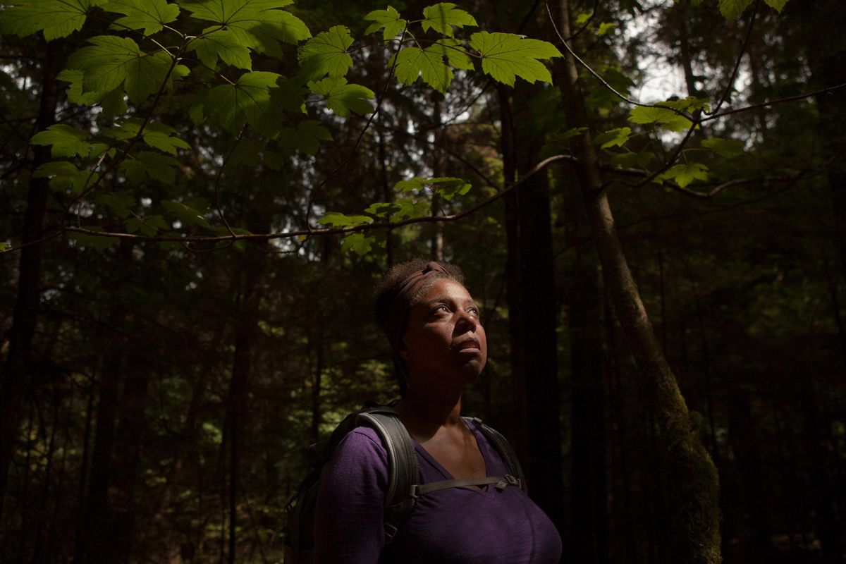 Shamay Thomas, 49, a nurse practitioner and outdoor enthusiast, explores Point Defiance Park in Tacoma, Washington. “We deserve to be in these spaces as much as anyone else,” she said of people of color. (Jovelle Tamayo / For The Washington Post)