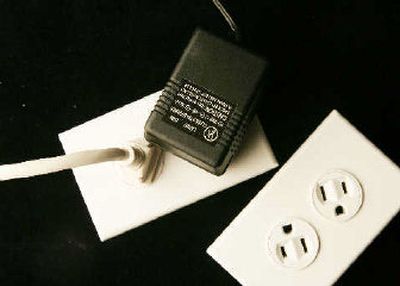 
This new electrical outlet swivels to accommodate larger plugs.  
 (Associated Press / The Spokesman-Review)