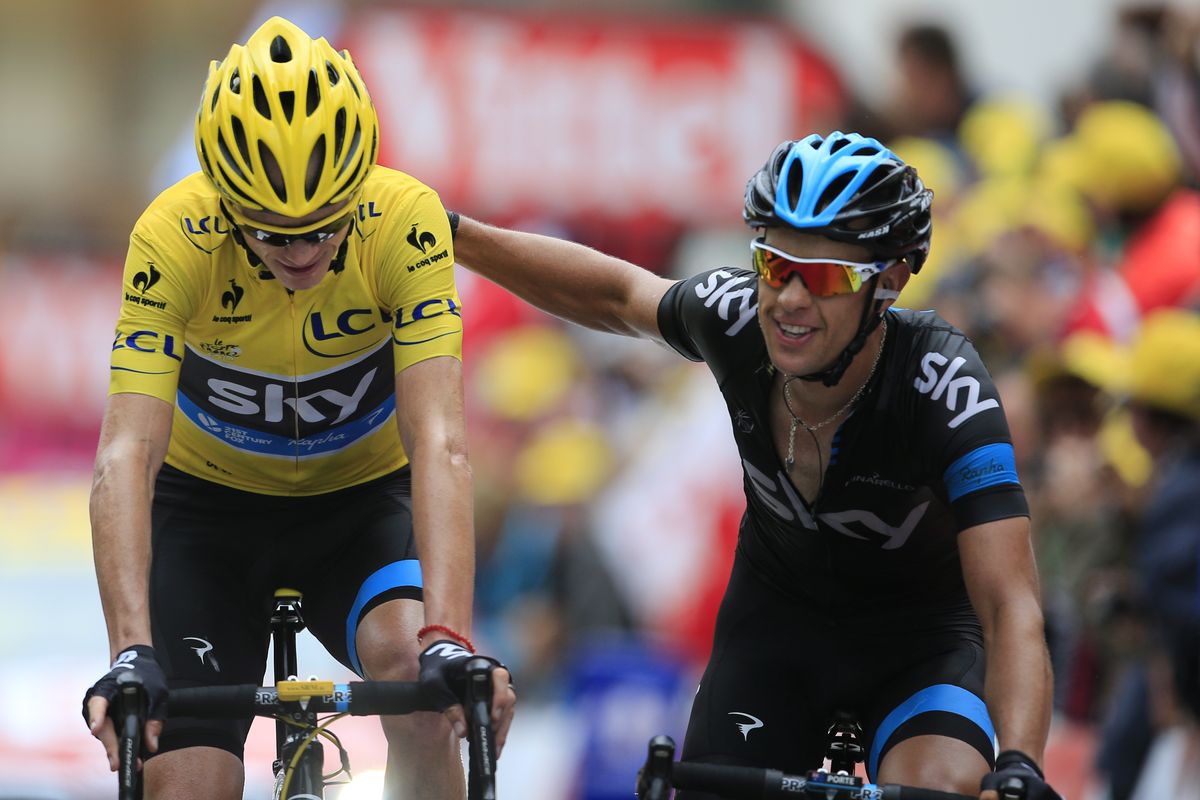 Richie Porte, right, congratulates teammate Christopher Froome, who wears the yellow jersey as the Tour de France’s overall leader. (Associated Press)