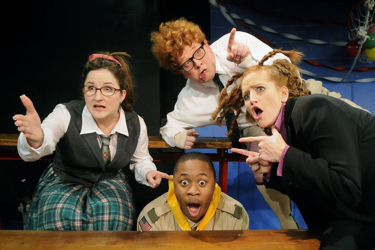Clockwise from left, Beth Carey as Marcy Park, Lance Babbitt as William Barfee, and Molly Ovens as Logainne SchwartzandGrubenniere catch David McElroy II, playing Chip Tolentino, as he tries to sneak back into the competition  in Spokane Civic Theatre’s production of “The 25th Annual Putnam County Spelling Bee.”  (Dan Pelle / The Spokesman-Review)