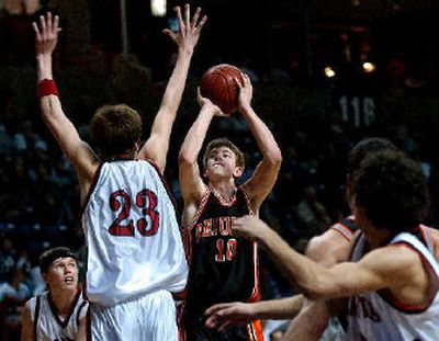 
Republic senior Zach Gianukakis spots up on the way to 22 points against Neah Bay on Thursday. 
 (Jed Conklin / The Spokesman-Review)