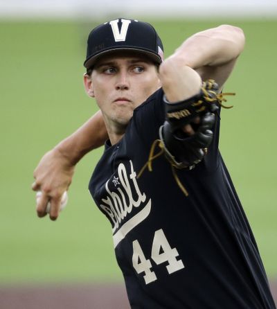 In this June 4, 2016, file photo, Vanderbilt starter Kyle Wright pitches against Washington in the first inning of an NCAA college baseball regional tournament game, in Nashville, Tenn. Wright is continuing the Commodores' history of producing blue-chip pitching prospects and could get taken first overall in Monday's draft. First he wants to help Vanderbilt reach the College World Series for the thirid time in four yearrs by knocking off No. 1 seed Oregon State in an NCAA super regional that begins Friday in Corvallis, Oregon. (Mark Humphrey / Associated Press)