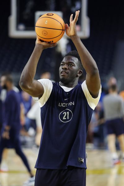Adama Sanogo of the Connecticut Huskies practices ahead of the 2023 NCAA Men's Basketball Tournament Final Four semifinal games at NRG Stadium on March 31, 2023, in Houston.  (Tribune News Service)