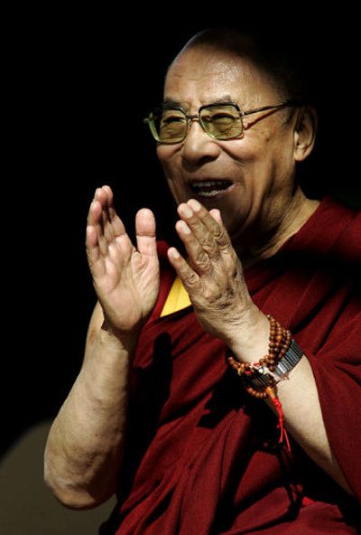 
The Dalai Lama speaks to reporters Sunday in Hailey, Idaho, after addressing a crowd of about 10,000. 
 (Associated Press / The Spokesman-Review)