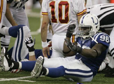 
Indianapolis Colts defensive end Robert Mathis (98) celebrates after Kansas City Chiefs quarterback Trent Green (10) fumbled during the fourth quarter.
 (Associated Press / The Spokesman-Review)